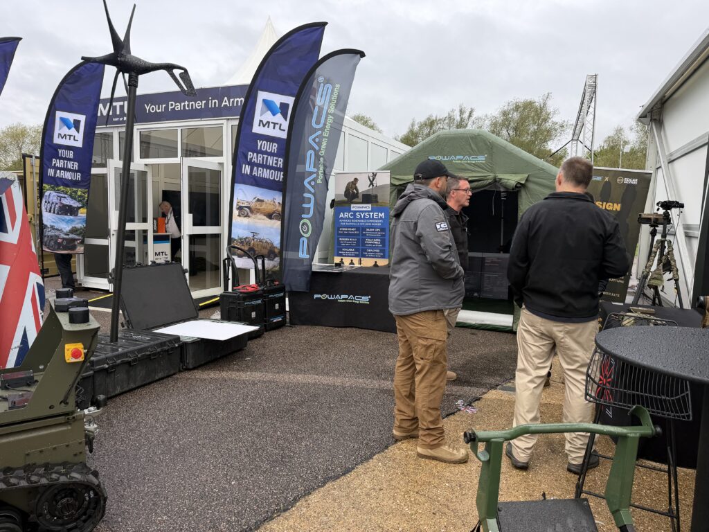 Powapacs stand with ARC Wind turbine at a defence exhibition